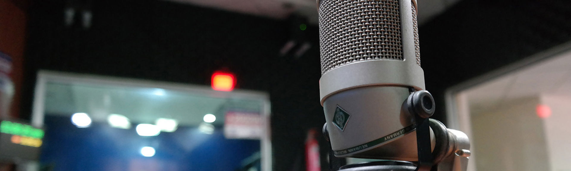 Close up shot of a radio microphone in a radio studio